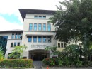 This office building, which houses the main branch of the Bank of Hawaii in American Samoa, sits on the corner of the coast road and the street that leads to the Executive Office Building and the public library. 