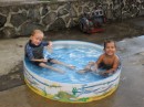 Kezzie (left) and Mateo play in a cool pool.