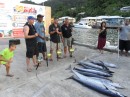 The winning team (note Andy at far right) receives new rods and reels.