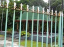 Behind the fence is the fale in the garden of the Lieutenant Governor residence.