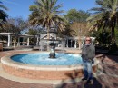 Jim beside the fountain in St. Marys waterfront park.