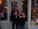 Bartender Cindy and hubby stand in front of Seagles to watch the parade.