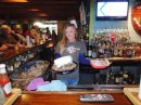 Sarah, "the sweetheart of Hurricane Pattys," serves up some delectable food with a delightful smile.