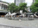 This gull feels right at home by this city fountain.