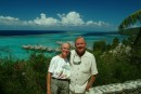 Ann & Jim above oceanside resort at scenic park.