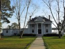 Jim calls: I must drive the truck to Belhaven, North Carolina, where the boat is now docked, so that we may drive to White Marsh, Virginia, to get a part for the engine. This old mansion, which has been turned into an inn, stands in front of the marina. 