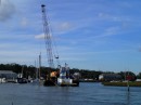 We return to the San Sebastian River to discover that it is being dredged, and we fall in behind the dredge barge as we make the final bend in the river before Rivers Edge Marina.