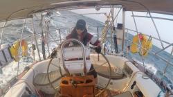 Anneka follows Simon in steady winds.  Steering is difficult as seas are pushing the boat around