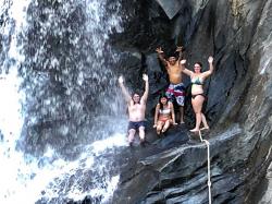Dalir, Sasha, Pichon, and our niece Anni, sliding down the waterfall rock at Quimixto.
