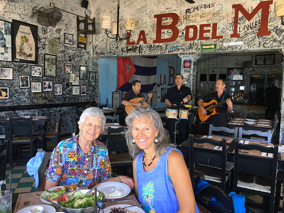 Jean and Heidi sampling black beans and rice, tostones, plantains, and more at La Bodeguita del Medio... delicious Cuban food accompanied by lovely Cuban music in the heart of Puerto Vallarta. Not to be missed!