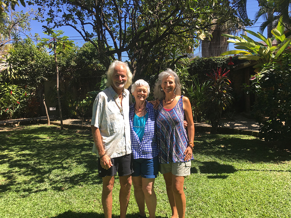 Captain Kirk, Jean-Mom, and Heidi surrounded by lychee, mango, papaya, banana, cocoa, cinnamon, coffee, guava, and guayabana trees... a lovely place for Kirk to recover!