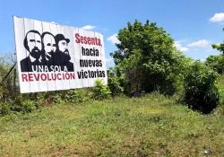 "A single Revolution, 60-years of New Victories"... another of the many propaganda signs along the highway. 