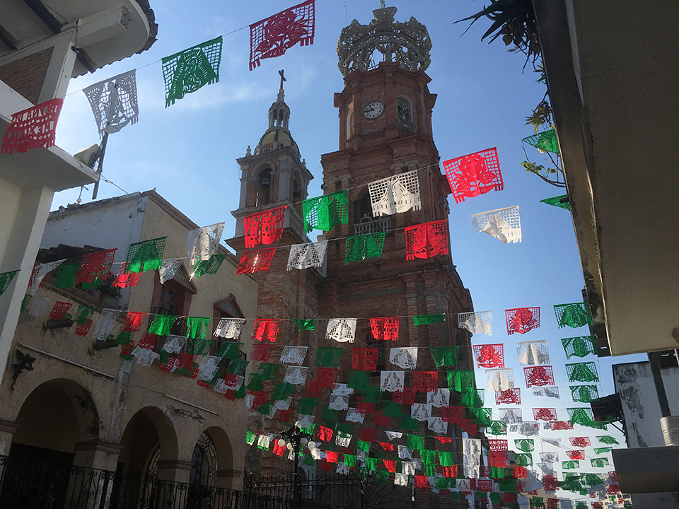 Guadalupe Cathedral with Papel Picado Banderitas lining the streets.