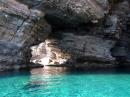 Entering into the Sea Caves on Isla Espirto Santo. The water is a magical neon-turquoise color.