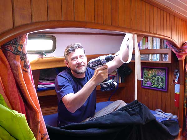 Mike installing lee cloths on all bunks. 