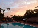 An early start to the day is rewarded with a beautiful sunrise over Hotel Tripui pool.