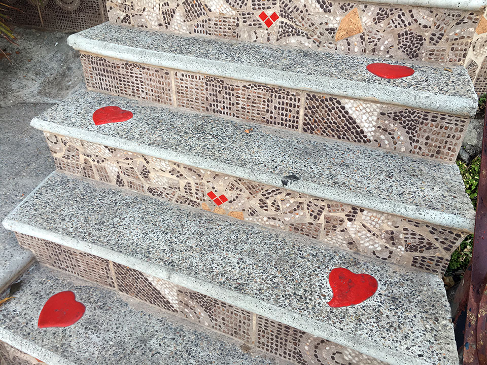 One of the artfully decorated stairs on the PV hillsides. As you follow these stairs up there are hearts along the way, ending in a glass mosaic of hearts outside someone