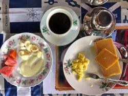 A typical Cuban "tourist" breakfast consists of: yogurt, eggs, bread, fresh tropical fruit, coffee, juice, and milk. All things that Heidi can