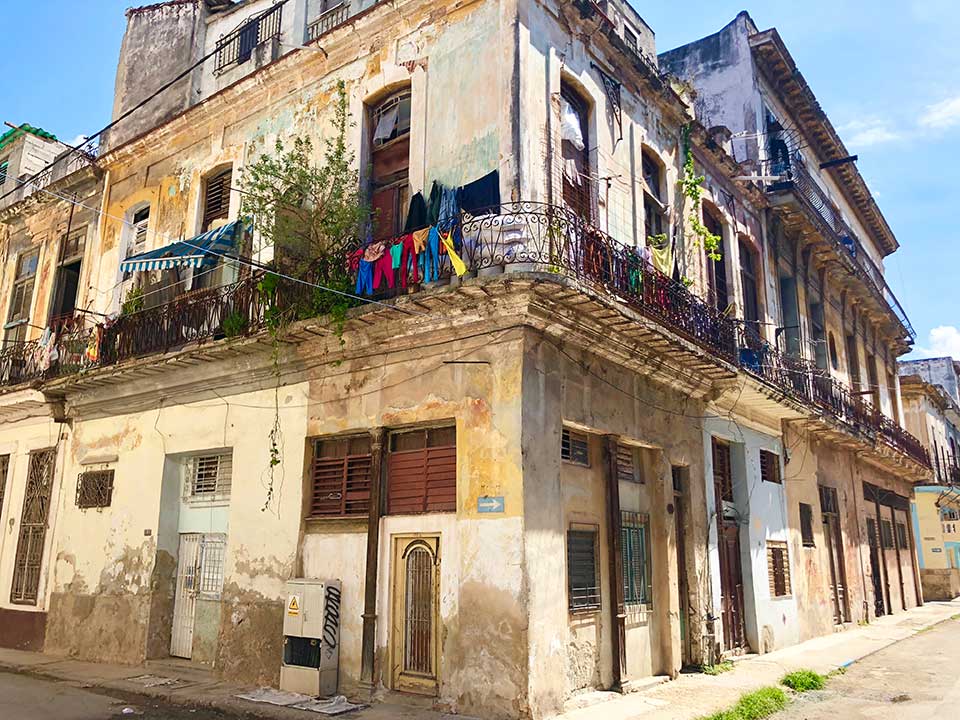 This house was down the street from our first Casa Particular in Havana, and similar to where we stayed, although the one we stayed in was in a lot better state of repair. Bel