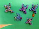 Brightly painted clay frogs, more Huichol art, they worship many animals.