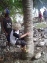 Learning to climb coconut trees in Suwarrow with Charlie, one of the two rangers