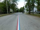 One of the places we stopped was Bristol, RI.  They have a red white and blue stripe going down the middle of the road to show the parade route. It