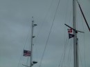 When we got to Bimini we went into a marina to make it as easy as possible for ourselves. Bill went to Customs and Immigration and when he had cleared in we were able to raise the Bahamian courtesy flag you see here, over our SSCA club flag.