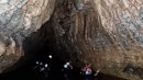 After we were finished with the zipping and rappelling we went on a boat ride through a cave.  At one point another tour came through the other direction on inner tubes. I was glad I was in a boat!