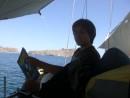 School time aboard Blackdragon.... Josh finds a cool area in the shade.