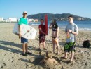 Francoise, (from sv Calou), Natalie, Nicholas, and Foster go body surfing at Ixtapa beach.