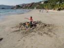 Natatia and Foster dig a pitt at Playa Ropa.