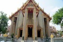 Wat Rajabopit Sathitmahasimaram Rajaworavihara,  as the term Mahasimaram in the name indicates there are eight stone pillars surmounted with a carving of Buddhist Wheel of Law  Bangkok  -  Thailand  -  28.03.2013