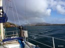 A mix of sunshine and showers always makes a rainbow, on Canna