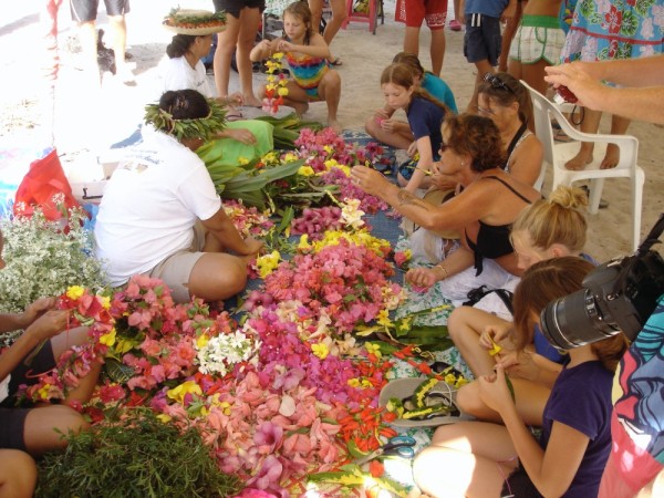 Locals and Puddle Jumpers working with flowers making all kinds of decorations.