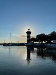 Harbortown marina lighthouse at dusk