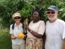 Pattie, Tim & Agnes with fruit