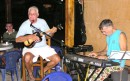 Tony and Smitty (the calypso artist the “Mighty Yachtie”) entertain the cruisers with one of Smitty’s original calypsos under the International Pavilion at the Trinidad & Tobago Sailing Club.  Every Monday night Tony would serenade the pot-luck diners with his music.  Check out those pants!