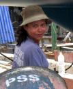 Mrs. So: Typical for women of the labor class in her home country, Mrs. So only has one name.  She is a tiny thing, and she hauls heavy barrels of trash all day at the PSS Shipyard for about 10 USD per day - a premium job compared to what is available to her in Myanmar.  Mrs. So seldom misses work because her family lives hand-to-mouth, and on days she doesn’t work her children only have a single meal.
