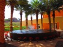 The Fountain at Marina Costa Baja surrounded by pointsettia plants
