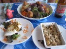 Martinique typical food: boudins creoles (blood sausages), stuffed crab, gratin of conch