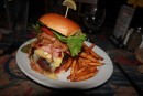 The Frenchy Burger: beef patty, brie cheese, apple, ham, onion chips on a brioche bun. Annapolis, MD