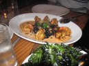 Onto fancy asian: grilled garlic shrimps with coconut milk, side of crispy spinach leaves. Fort Lauderdale, FL