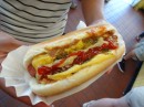 Hot dog with the works. Notice the pickle relish and the squeezy cheese...NYC