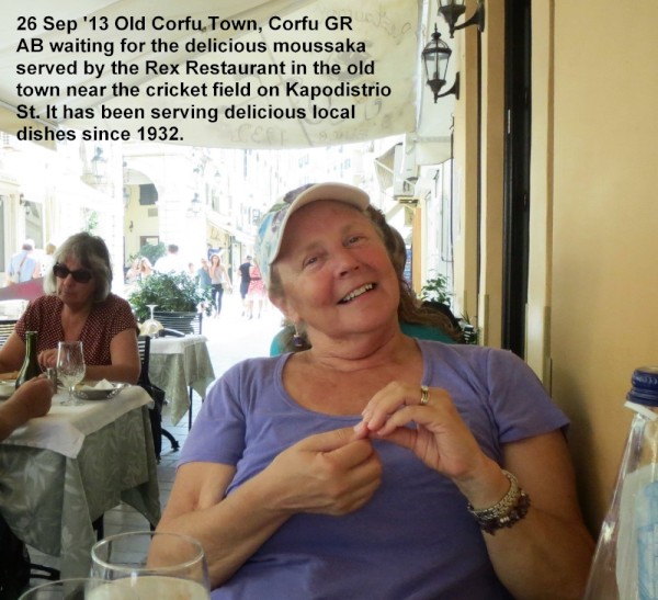 26 Sep 13: AB awaiting her favorite Greek dish of Moussaka at one of Corfu