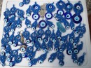 Evil Eye anyone?  These talisman have been around since classical times and are intended to reflect the evil intent back onto the onlooker. For full protective effect, they must be presented as a gift.