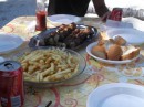 Tuna kabobs, french fries and french bread. Barefoot lunch on Ile Tautau, by the Coral Gardens. 