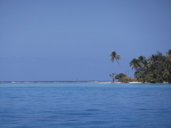 Ile Mahea, coral reef and the pacific ocean beyond.