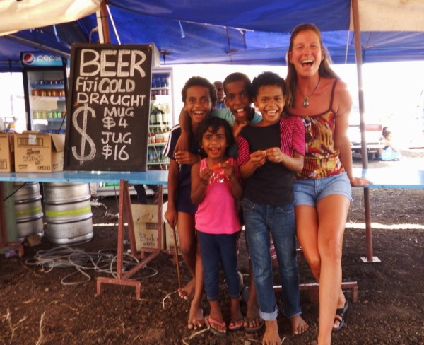 Monica and some of the local kids in the beer garden at the horse races.