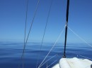Motoring along with beautiful flat seas.  The blue skys just merge into the blue seas.