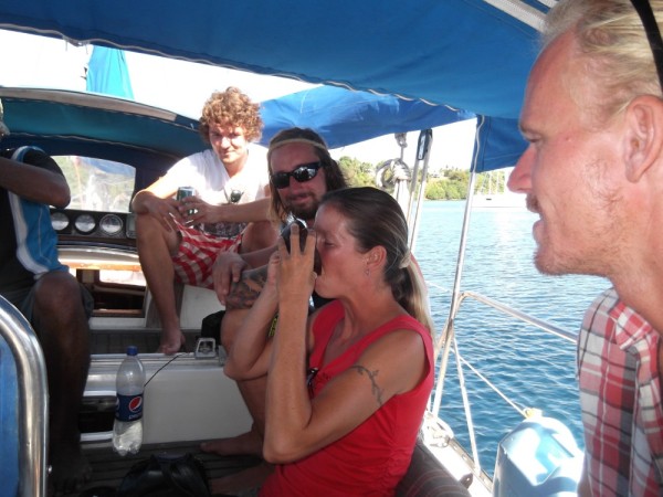 Monica drinking kava for the first time, on board SV Aud